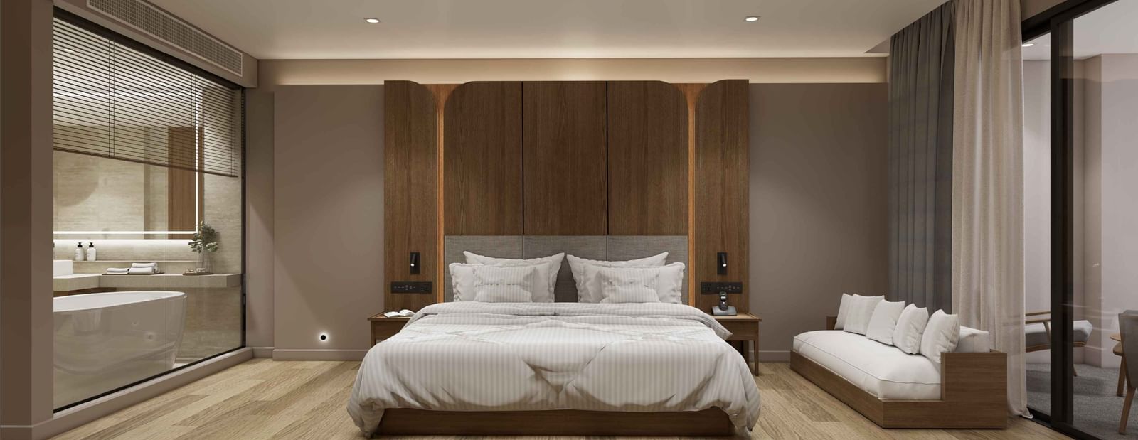 Bedroom with large bed, sofa, and wooden flooring at Ramada Resort by Wyndham Khao Lak.