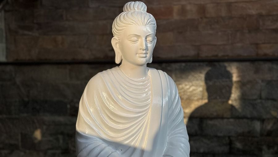 Buddha statue in the outdoor garden at The Pavilion, Nainital