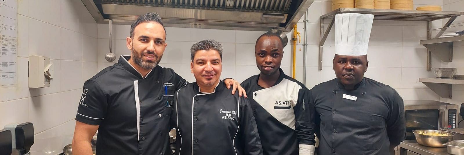 The chefs of Asiatic Lounge restaurant in Kenya standing