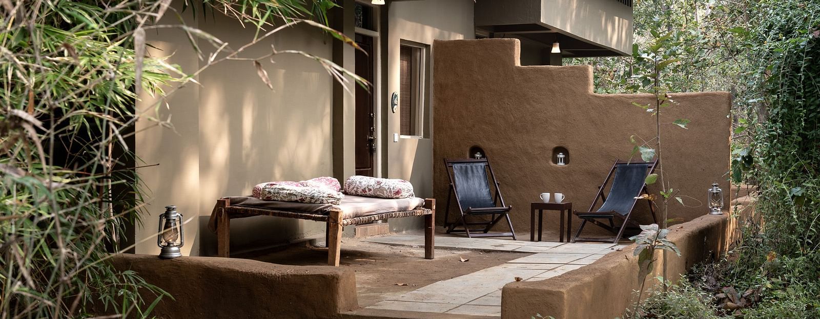 Sit-out area outside Jungle cottage at Saccharum Safari Lodge, Balaghat