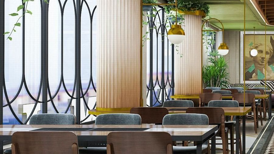 An image of a restaurant at Themis Barbecue House featuring chairs and tables on one side and on the other there is a counter 