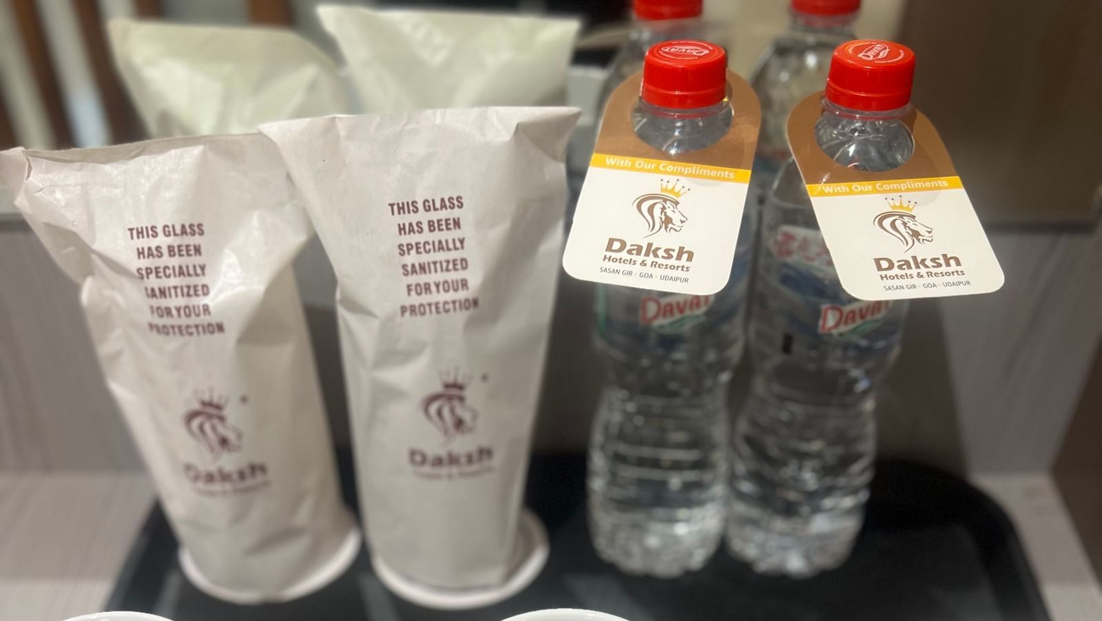 Tea and coffee making amenities placed on a tray in Daksh Comfort room at Daksh The Valley Resort, Saputara.