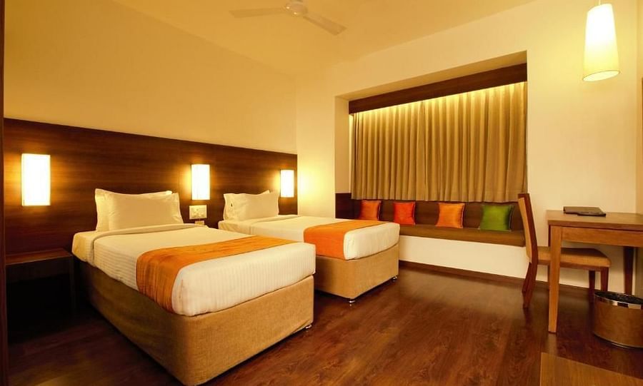alt-text Temple Tree Hotel near Christ University, Temple Tree Hotel near NIMHANS Hospital Bangalore, best hotel near Christ University and NIMHANS Hospital near Hosur RoadRooms at Temple Tree, Hotel Near Lalbagh, Rooms In Lakkasandra 3