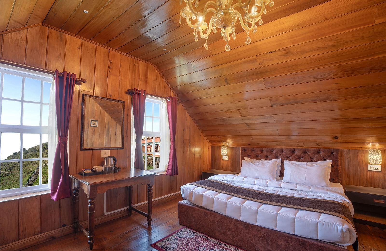 A room at Poshtel, Meghma with a double bed and side tables