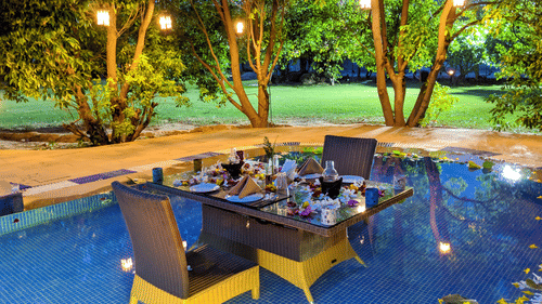 Seating in swimming pool private dining- The Golden tusk