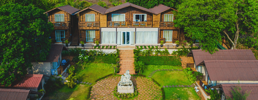 The cottages at Stone Wood Resort & Spa embraced by trees and greenery 0508
