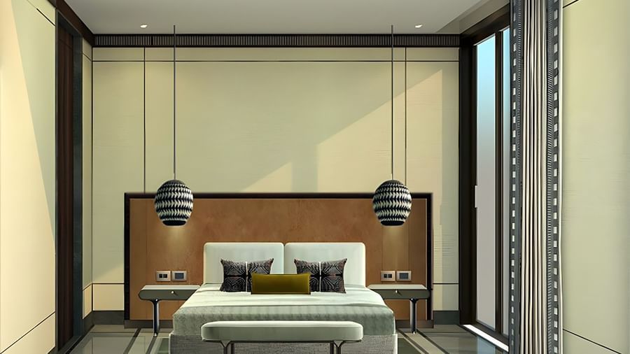 Bedroom in Sanctuary Suites at The Riverview Retreat, Corbett with king-size bed, warm lighting, and modern interiors.