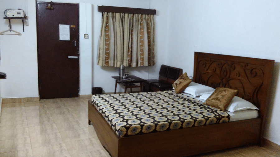 Executive Room has a work desk and an office chair in the corner near to the window