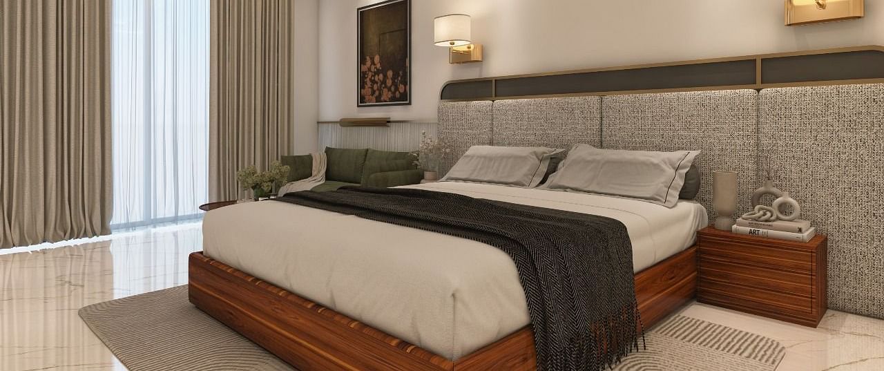 A room with modern interiors and bright lighting featuring a double bed in the middle along with two bed side tables. - Namaste Corbett