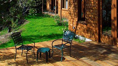 The exterior of a rustic resort with wooden siding - Brewery Gulch Inn & Spa