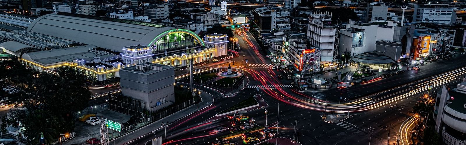 aerial view of Bangkok city at night with a long exposure on the cars going on the highway