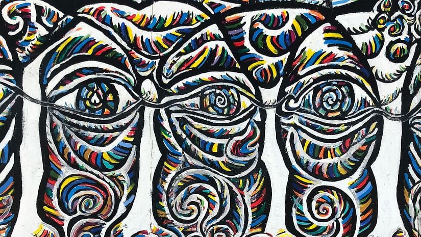 an overview of an abstract art with mesmarising characters on it
