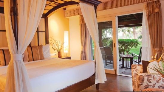 interior of a bedroom at The Serai Kabini-19