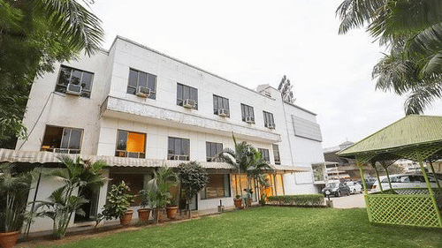 Facade image of VITS Select, Bharuch during an overcast day. 