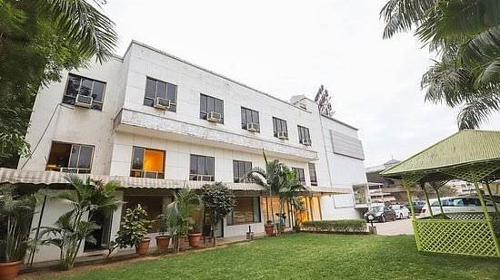 Facade image of VITS Select, Bharuch during an overcast day. 