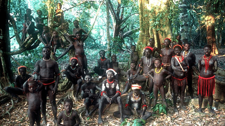 Tribal people in the Andaman Islands gathered in a group in the forest for taking a picture
