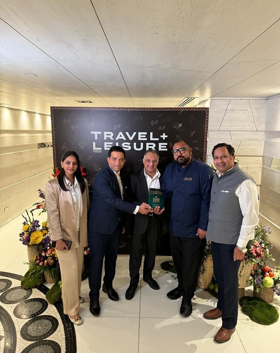 People receiving awards from the Travel & Leisure Delicious Dining Awards.