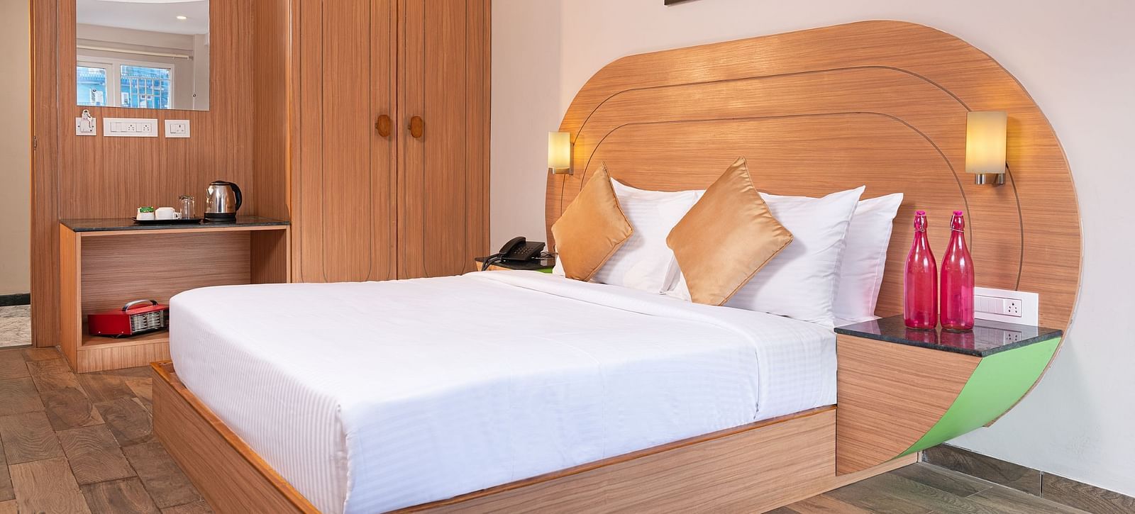 An image of a well furnished bedrooom  | Mango HIll Central, Ooty