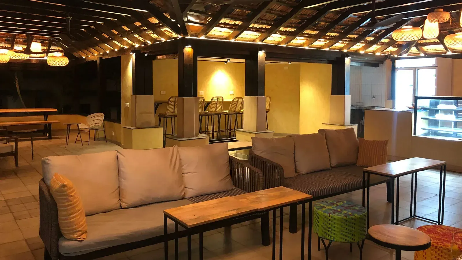 A communal space with seating area at Indie Stays Resort, Goa