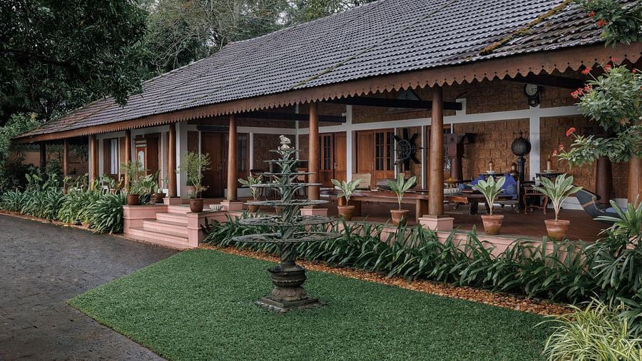 A facade of BluSalzz Villas - Muhamma Resort, Alleppey featuring the villas and greenery around it