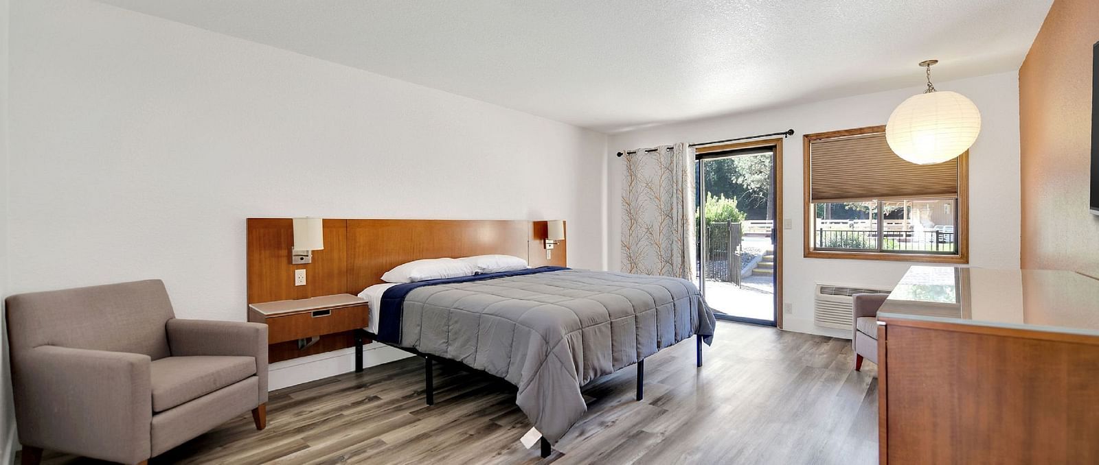 A view of a room at Amador Hotel with a double bed.