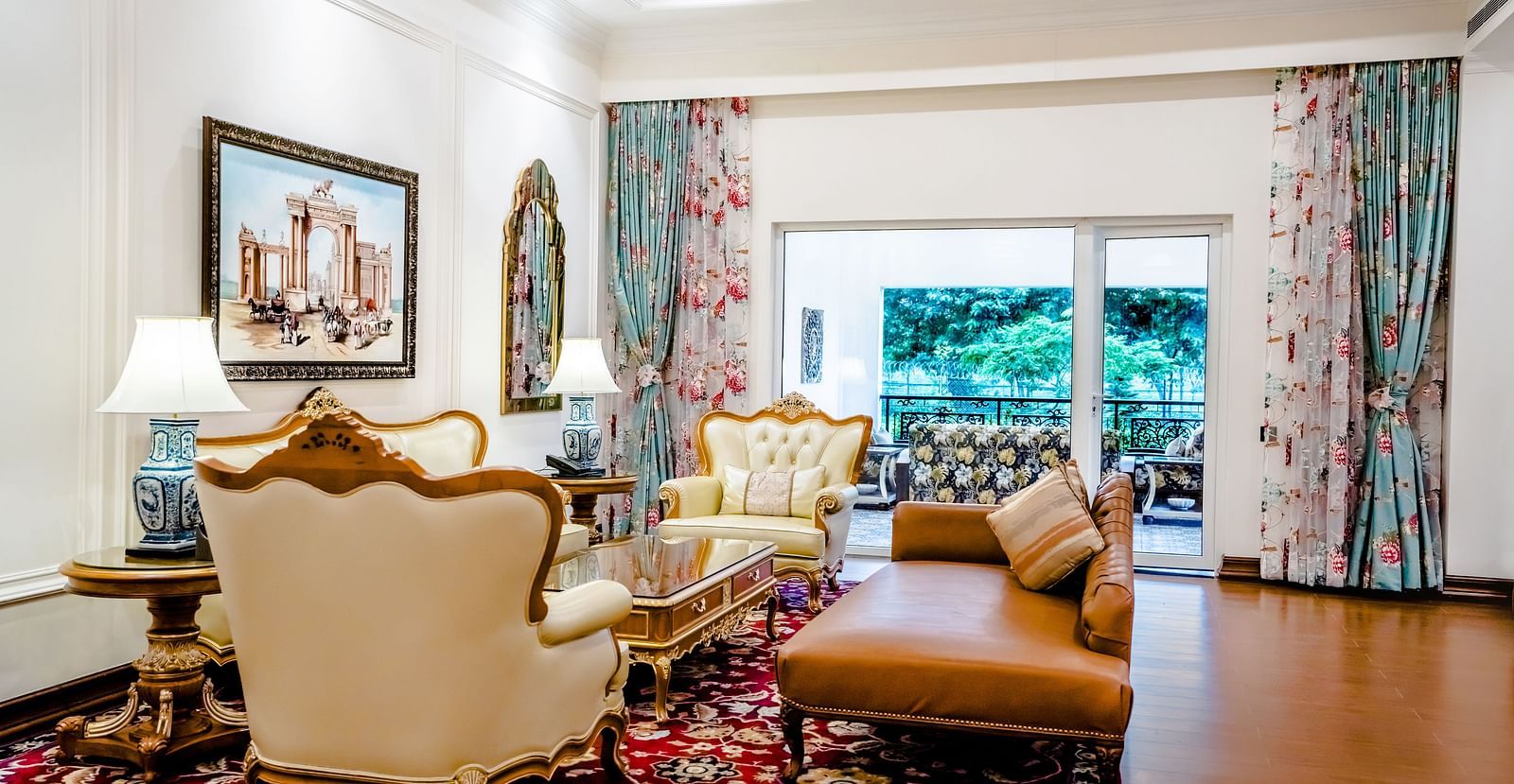 a sofa set in the living room - Mayfair Tea Resort, Siliguri 