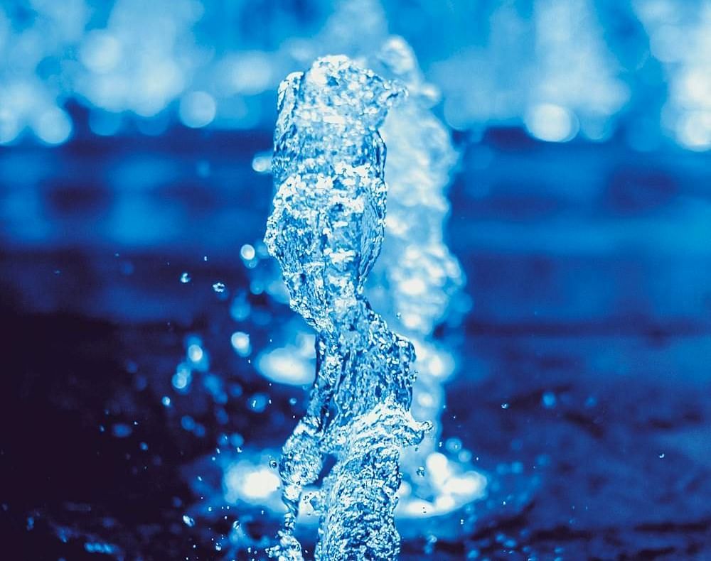 A close-up shot of a flowing water fountain.