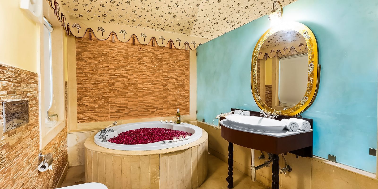 An overview of a bathroom with a round bathtub seen - Rajasthali Resort & Spa, Jaipur.