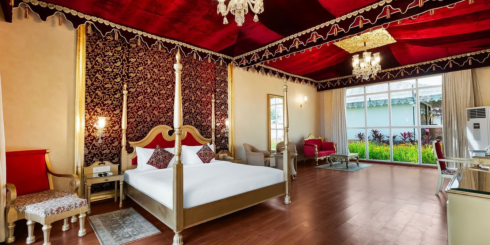 An overview of a room with a double bed, side tables and lamps seen - Rajasthali Resort & Spa, Jaipur.