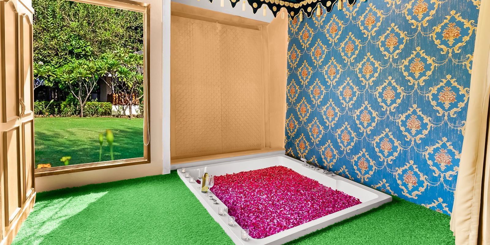 An overview of a bathroom with a bathtub filled with rose petals - Rajasthali Resort & Spa, Jaipur.