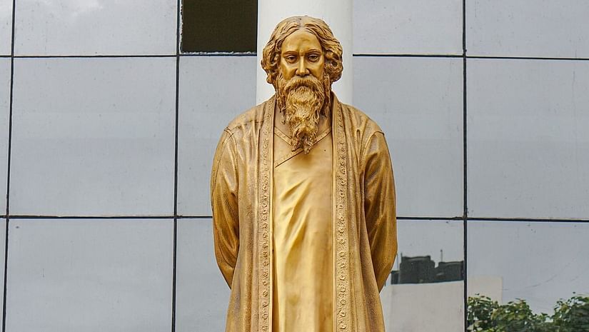 A golden colour statue of Rabindranath Tagore