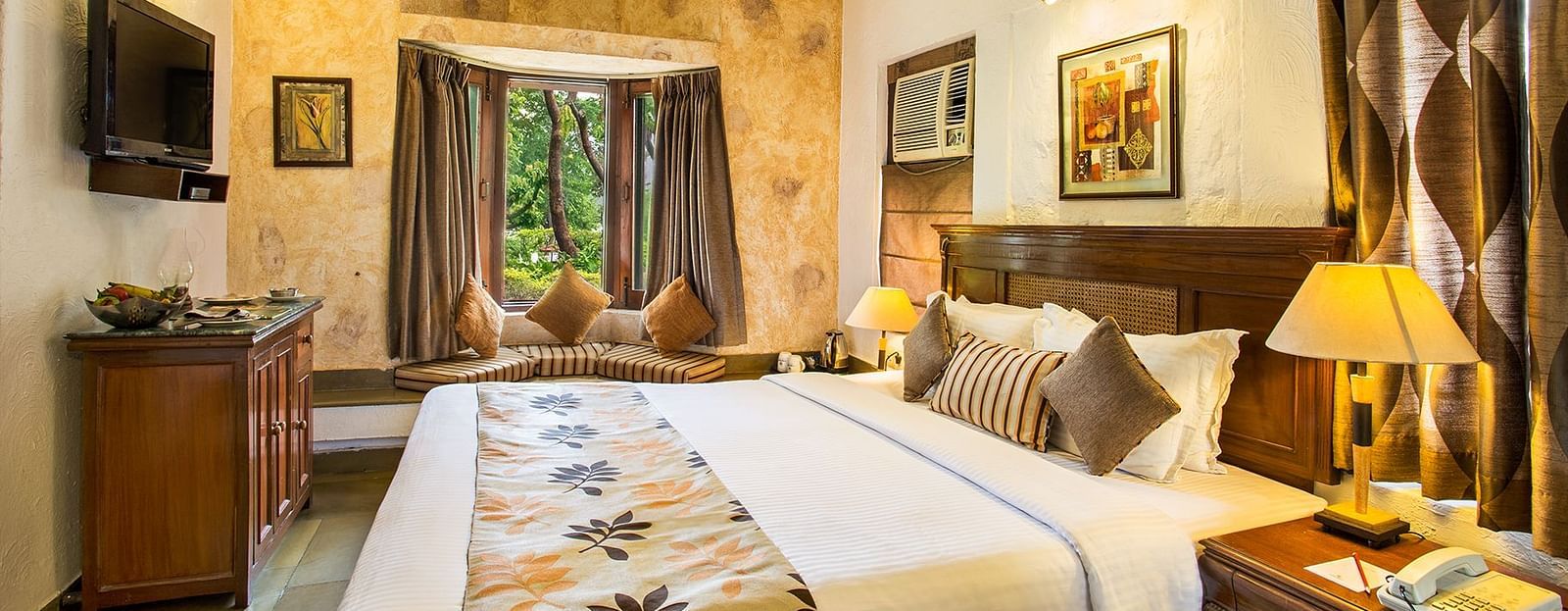 An image of a bedroom with king size bed, wooden ceiling where a fan is hanged,  cabinet and tables, etc. - The Riverview Retreat, Corbett