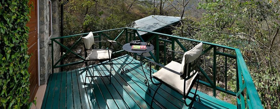 balcony with chairs and table 