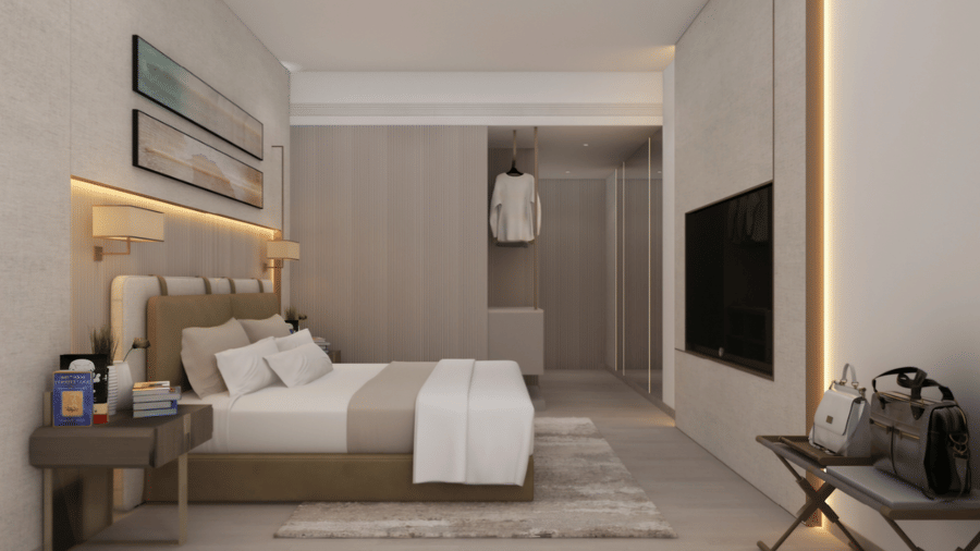 Superior Room at Tulip Inn Bidar featuring a double bed, bedside table, wall-mounted television, open wardrobe, and a folding luggage rack.