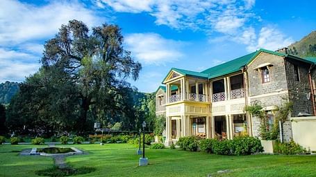 A facade image of Balampur House in Nainital