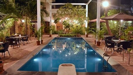 A swimming pool at Mani Mansion