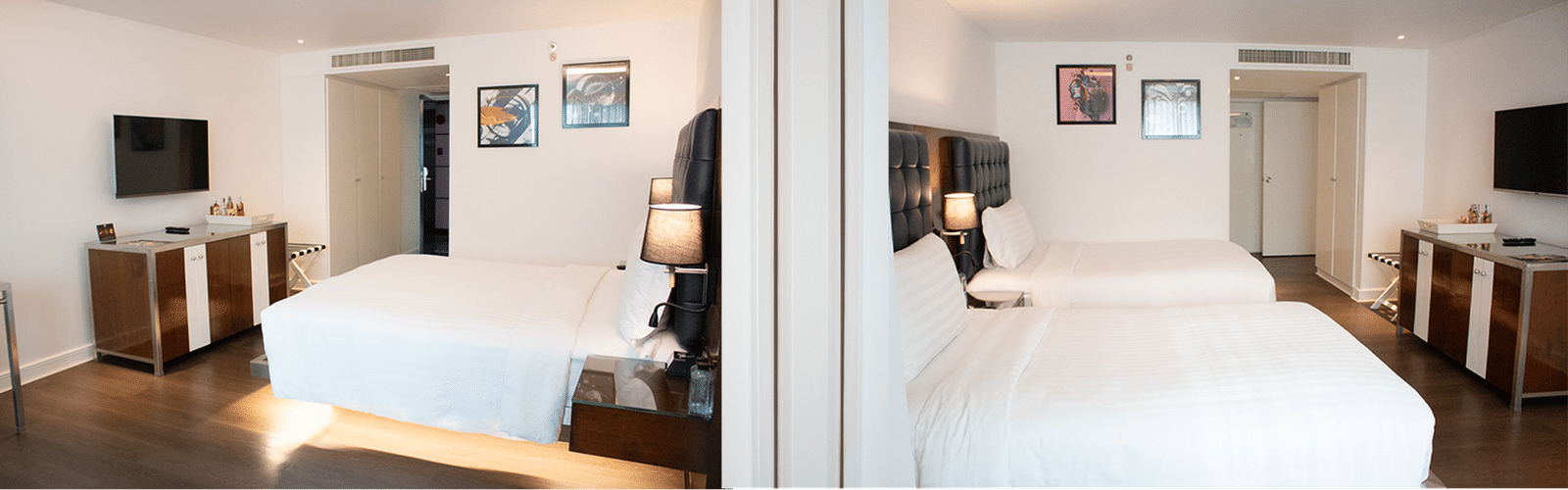 Guest room at Night Hotel Bangkok with twin beds and work desk.