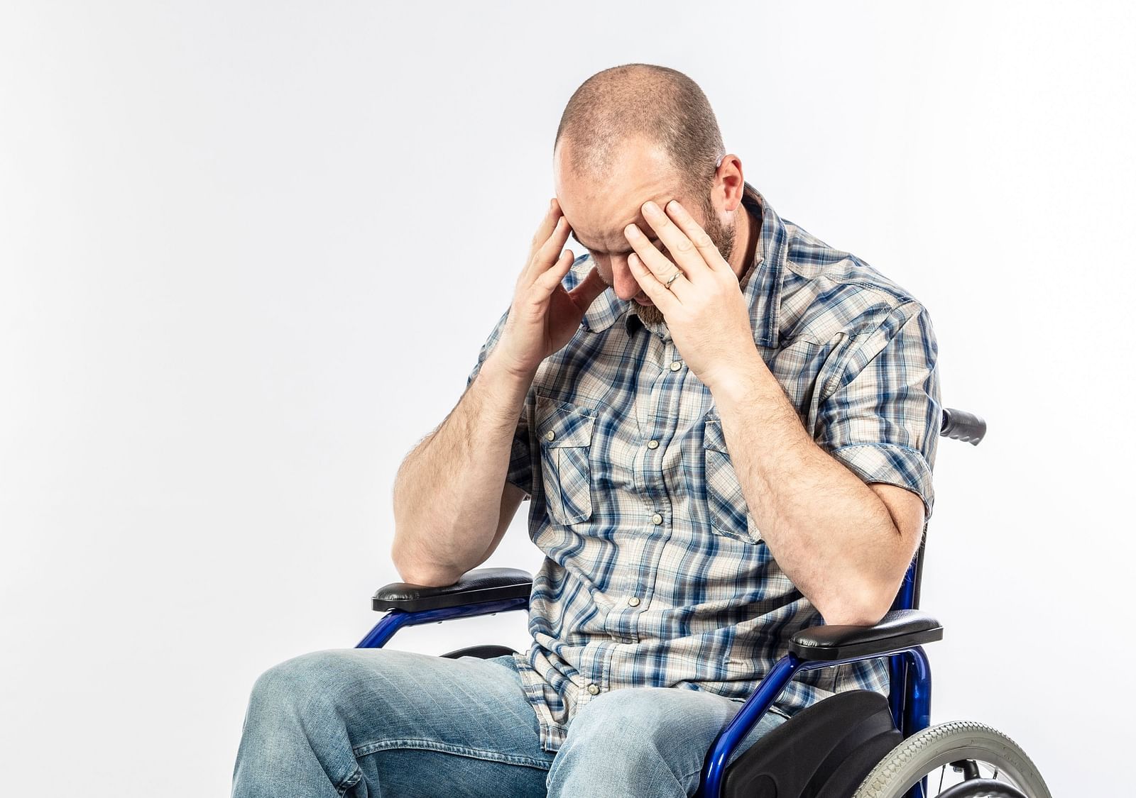 A man in a wheelchair likely facing mobility challenges - Shreyas Retreat
