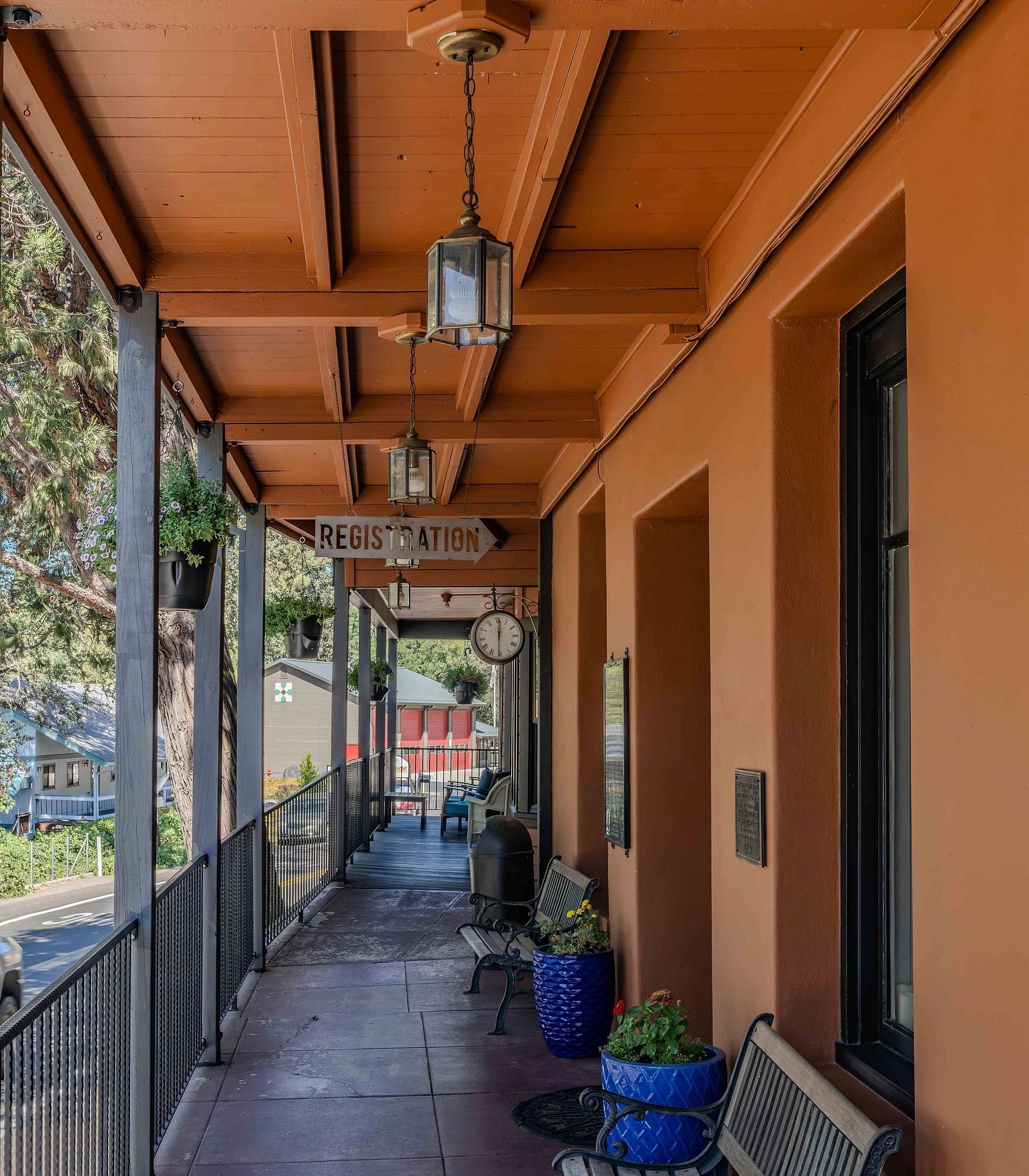 Outdoor corridor area leading to the registration desk - The Groveland Hotel. 