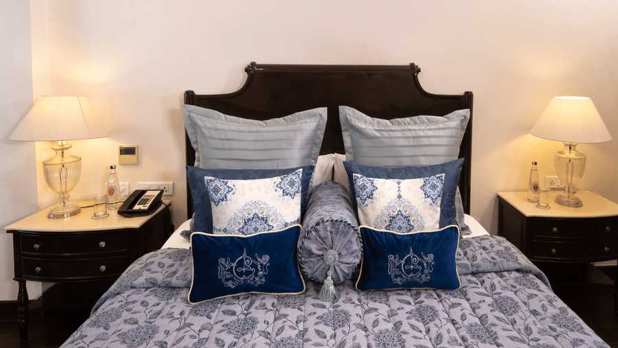 image of the bedding set of the Claridges Room at The Claridges Nabha Residence