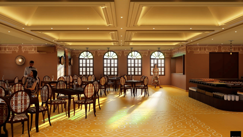 Bar at MGM Paradise Resort, Kumbakonam featuring several sets of tables and chairs, and a food counter area.