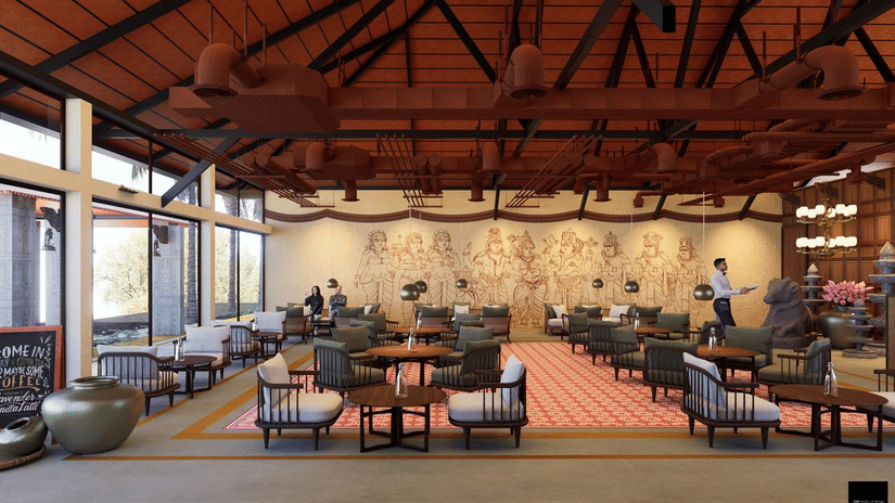 Restaurant with attic style roof at MGM Paradise Resort, Kumbakonam featuring chairs and tables, fountain, and other decorative elements.