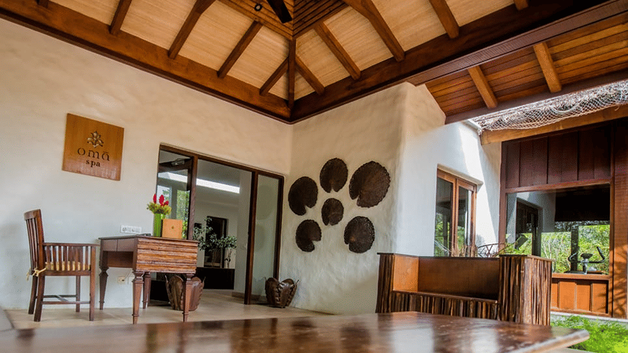 An overview of the Spa with a wooden massage table in view at The Serai Bandipur.