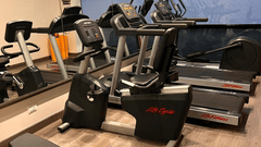 Fitness Centre at Sarovar Portico Outer Ring Road in Bengaluru featuring multiple treadmills that are placed the room.