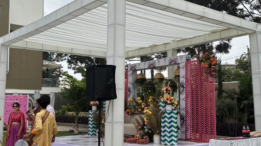 An elegant stage decorated with drapery, set up for a wedding function - VRR Astoria Hotel and Conventional Centre