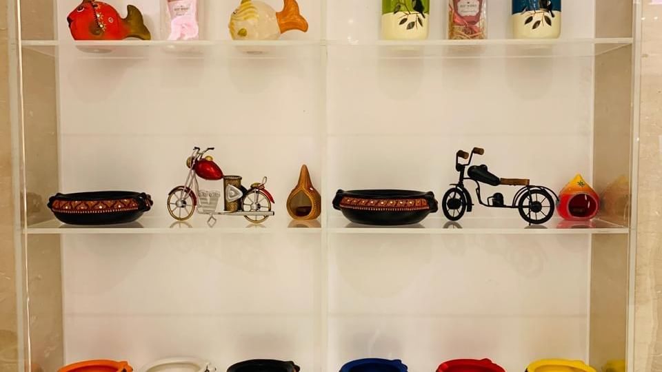 Display shelf with colourful souvenirs and handicrafts
