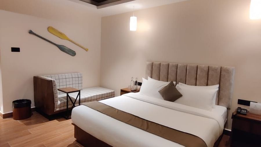 Luxurious bedroom with wooden ceiling accents and soft ambient lighting - Arina Island Resort, Swaraj Dweep