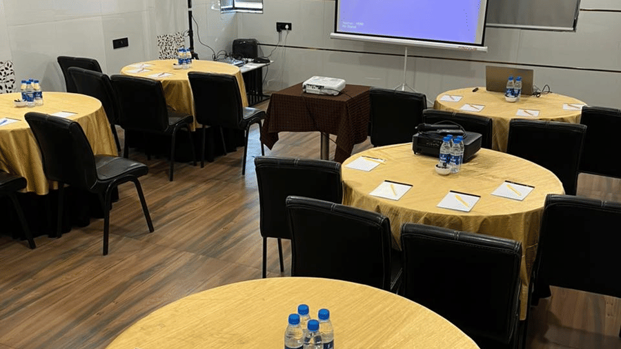 Conference setup with round table seating, perfect for meetings and group discussions.