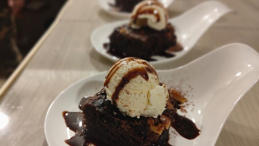 A row of bowls with brownies and ice cream on a table | Matsya Island Retreat