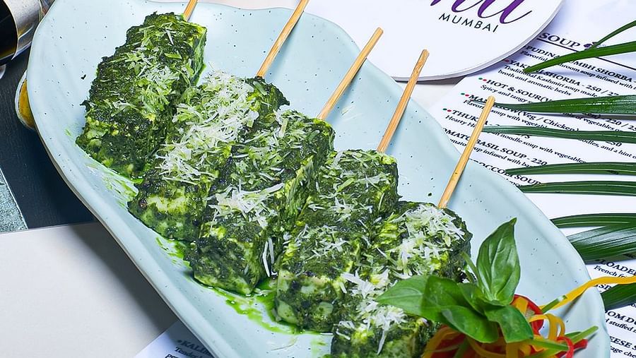 Herb marinated paneer skewers with salad garnish served at Hotel Mumbai House Mindspace, Malad.